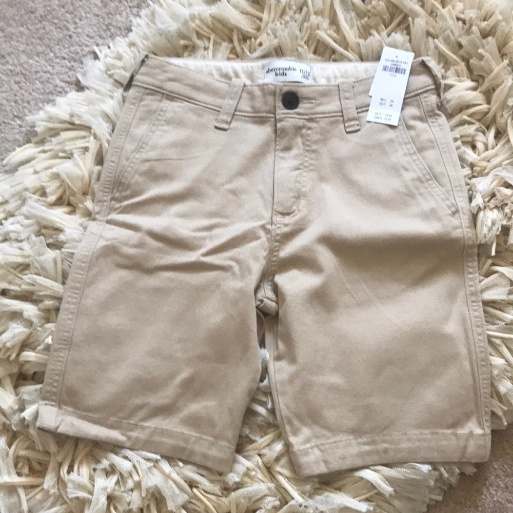 Kaki boy shorts.  Brand new with tags. Size 11-12